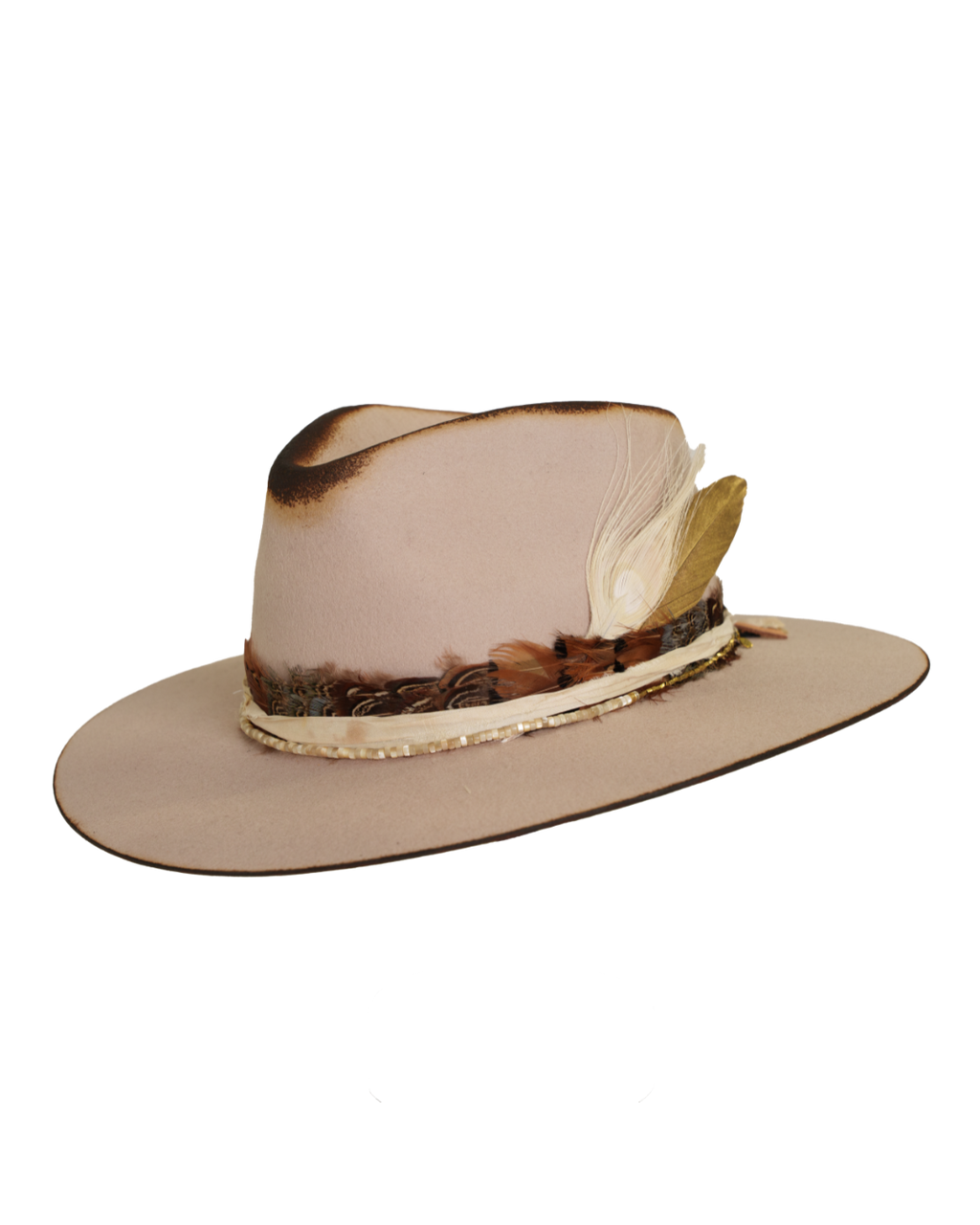 three quarters angled view of a light tan wide-brim felt fedora with a hand-burned crown edge and layered feather hat band with quartz stones
