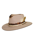 three quarters angled view of a light tan wide-brim felt fedora with a hand-burned crown edge and layered feather hat band with quartz stones